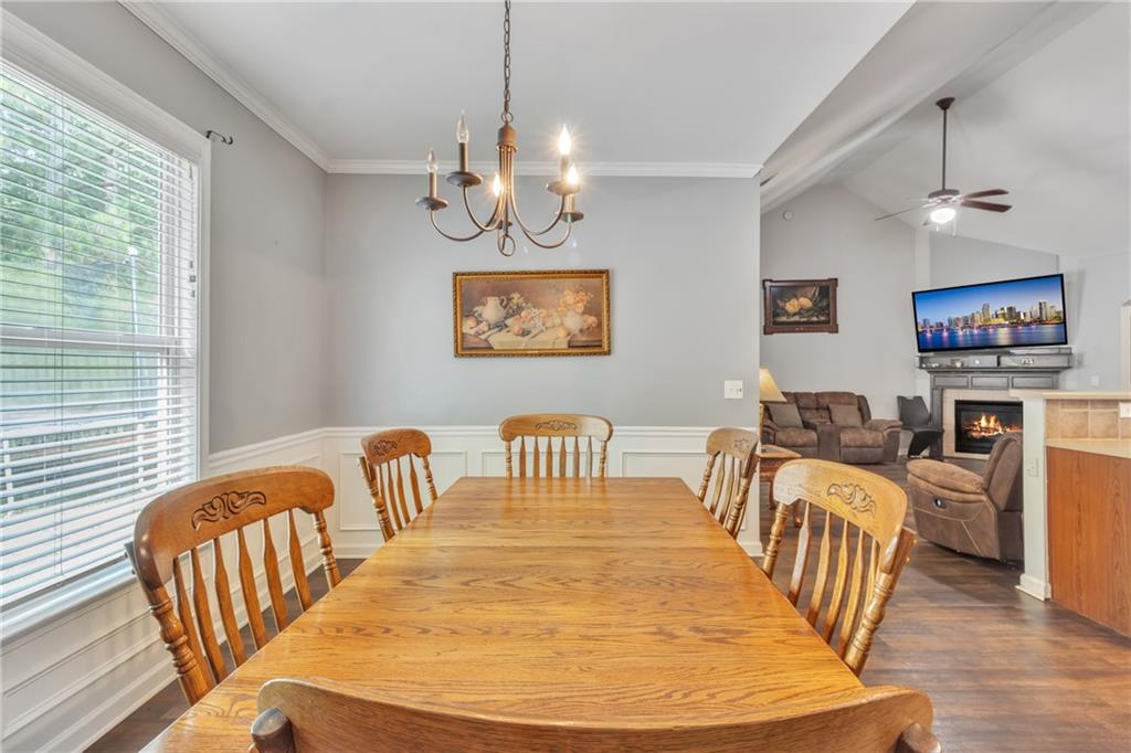 4044 Amberleigh Trace Gainesville, GA 30507 - Photo 5 of 22 a view of a dining room with furniture