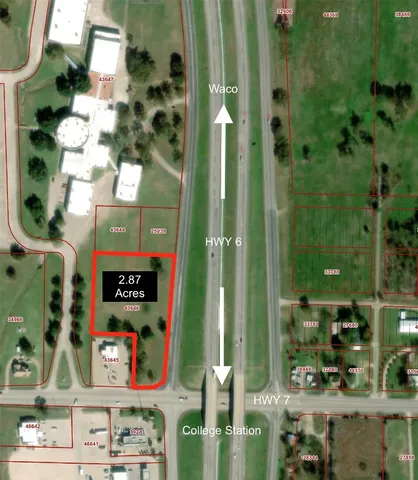 a bathroom with a sink mirror and vanity