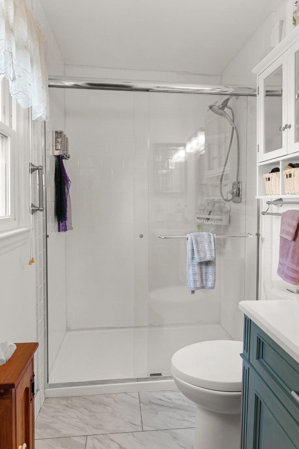 8871 Butternut Street Manassas, VA 20110 - Photo 16 of 29 Primary bathroom with walk-in shower.