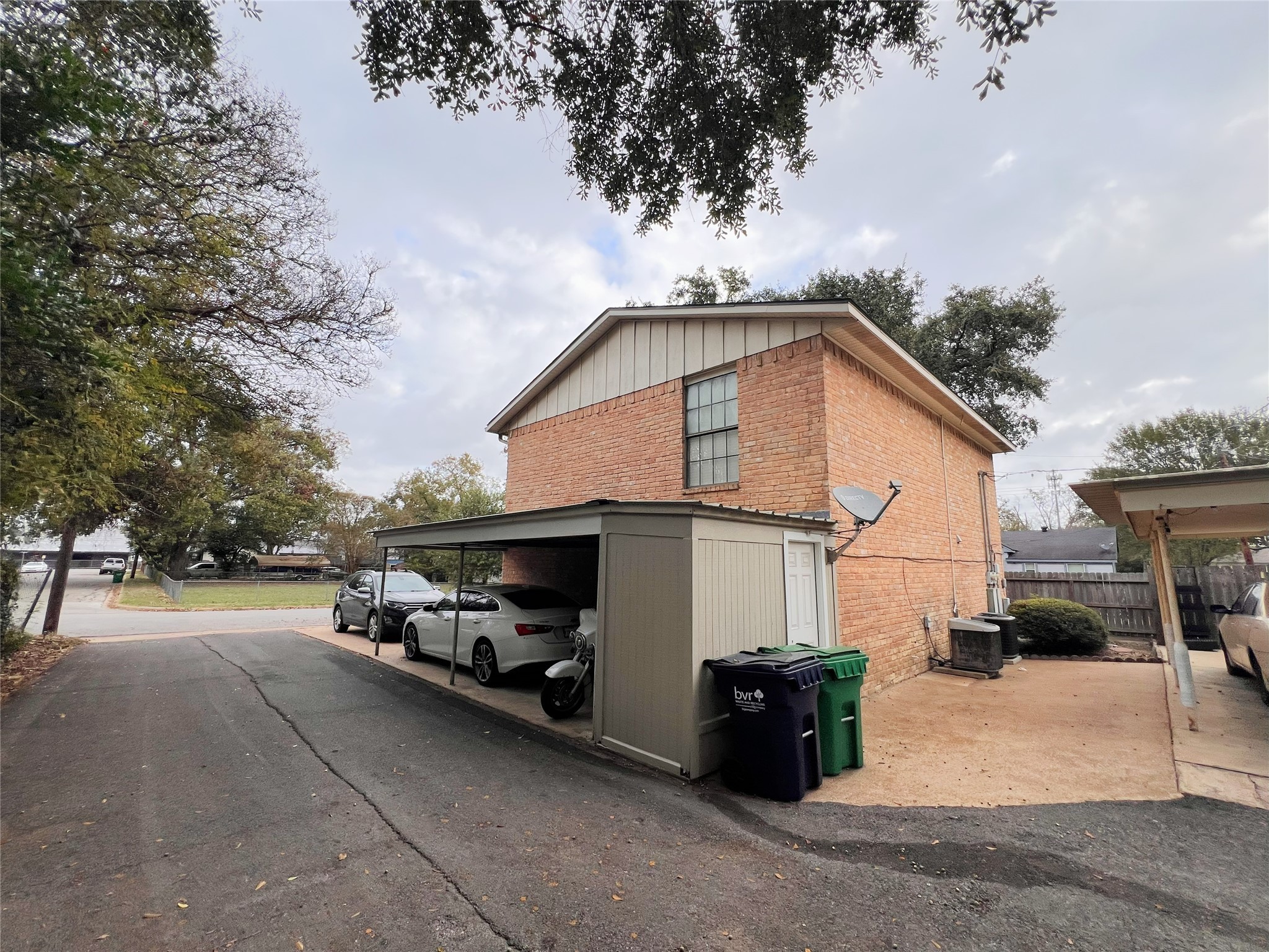 602 South Jackson Street Brenham, TX 77833 - Photo 11 of 12 a view of a car park in front of house