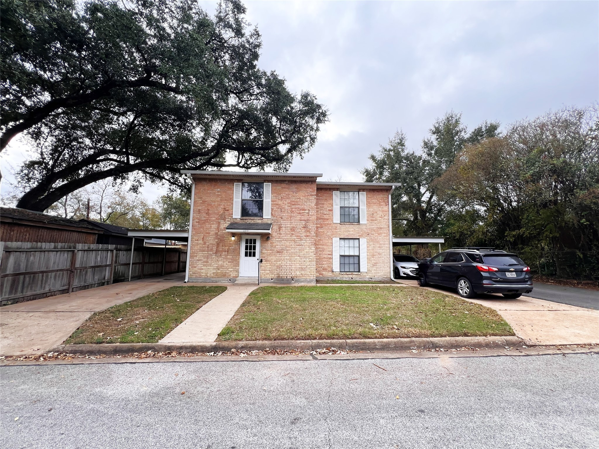 602 South Jackson Street Brenham, TX 77833 - Photo 12 of 12 a view of a house with a patio