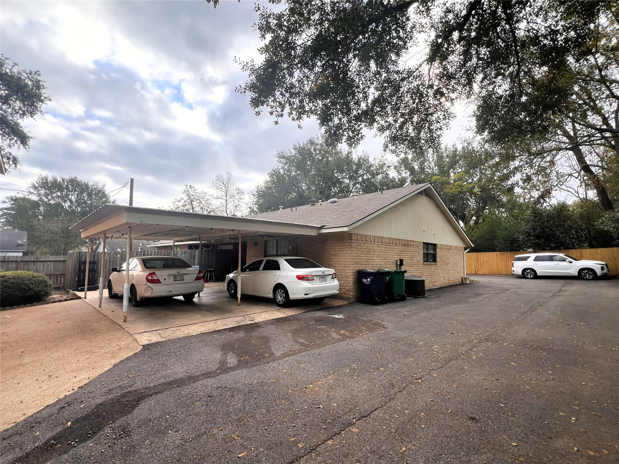 602 South Jackson Street Brenham, TX 77833 - Photo 10 of 12 a view of a car parked in front of a house