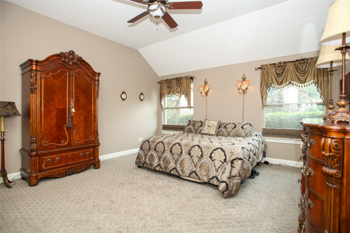 1589 Cool Spring Way Austin, TX 78737 - Photo 18 of 35 a bedroom with a bed and window