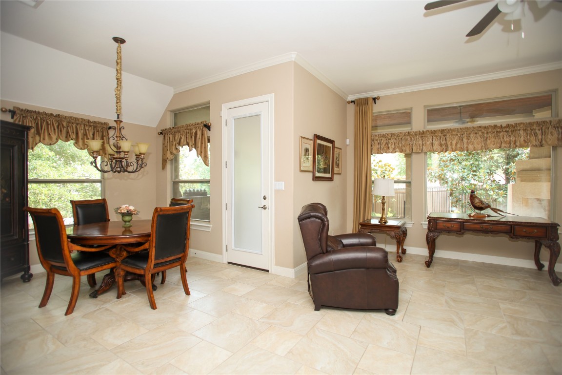 1589 Cool Spring Way Austin, TX 78737 - Photo 3 of 35 a living room with furniture and a large window