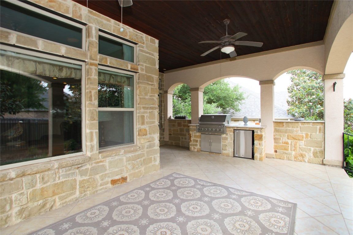 1589 Cool Spring Way Austin, TX 78737 - Photo 34 of 35 a view of an entryway with a house