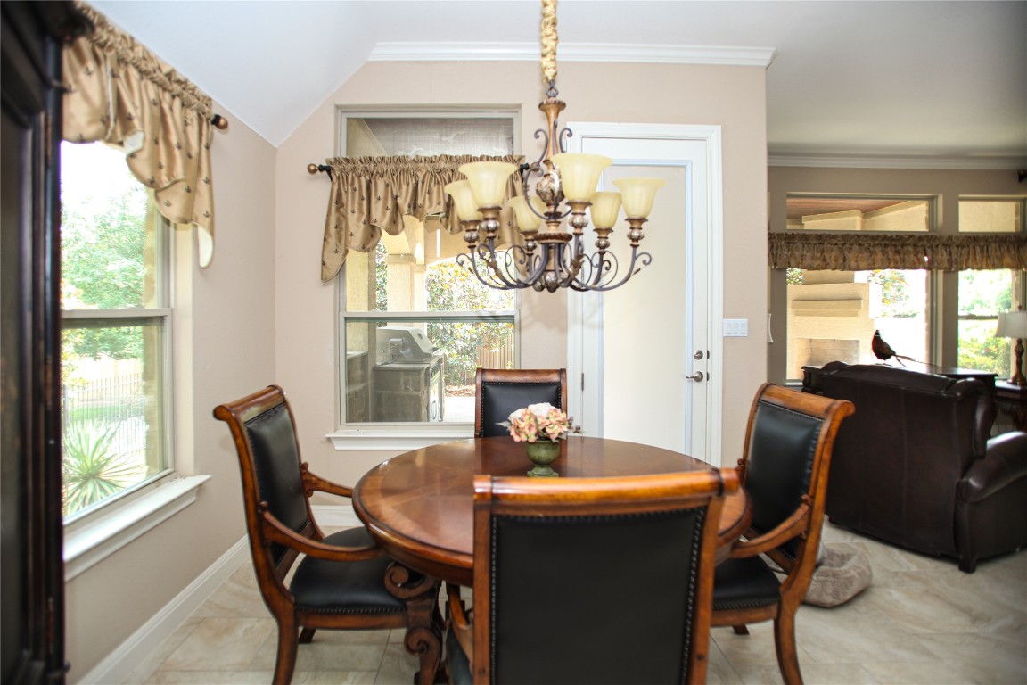 1589 Cool Spring Way Austin, TX 78737 - Photo 6 of 35 a dining room with furniture and window