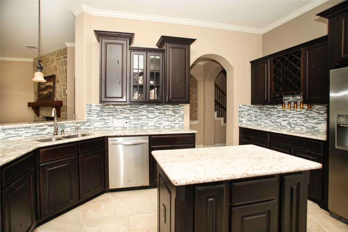 1589 Cool Spring Way Austin, TX 78737 - Photo 9 of 35 a bathroom with a granite countertop sink and a mirror