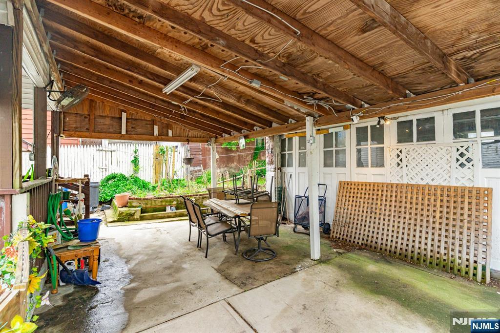 73-75 Knickerbocker Avenue Paterson, NJ 07503 - Photo 26 of 27 a view of a chairs and table in the patio