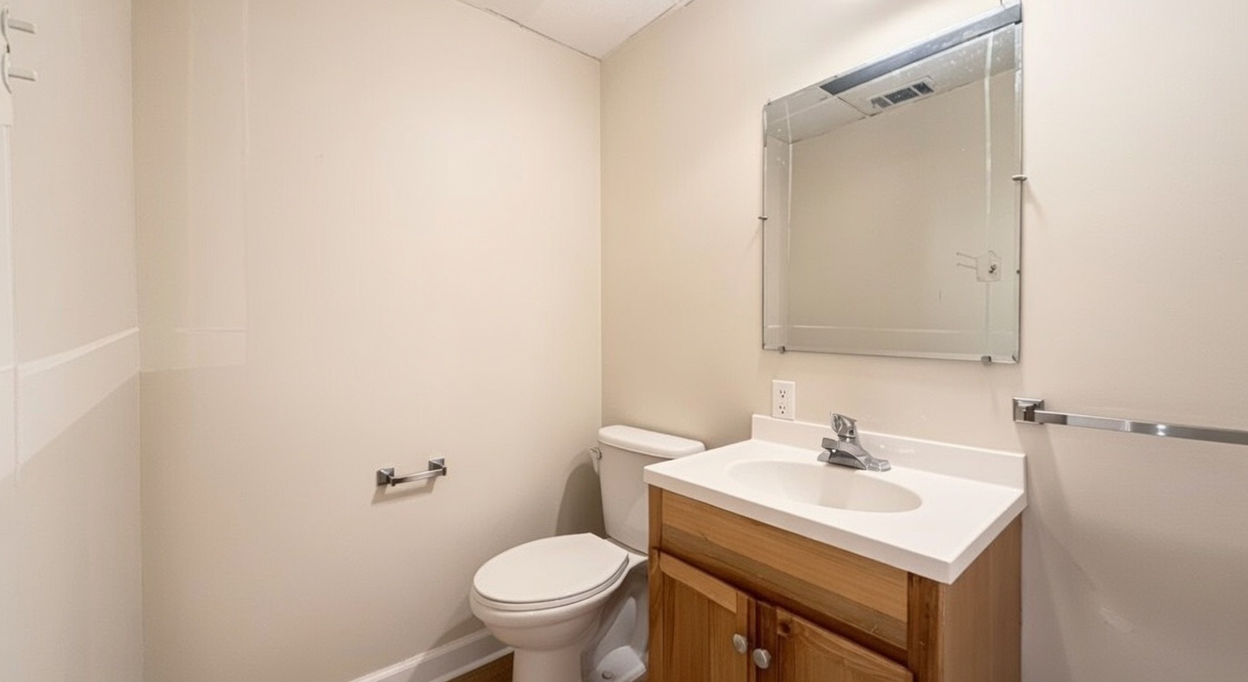 1828 183rd Street Homewood, IL 60430 - Photo 17 of 21 a bathroom with a sink toilet and mirror