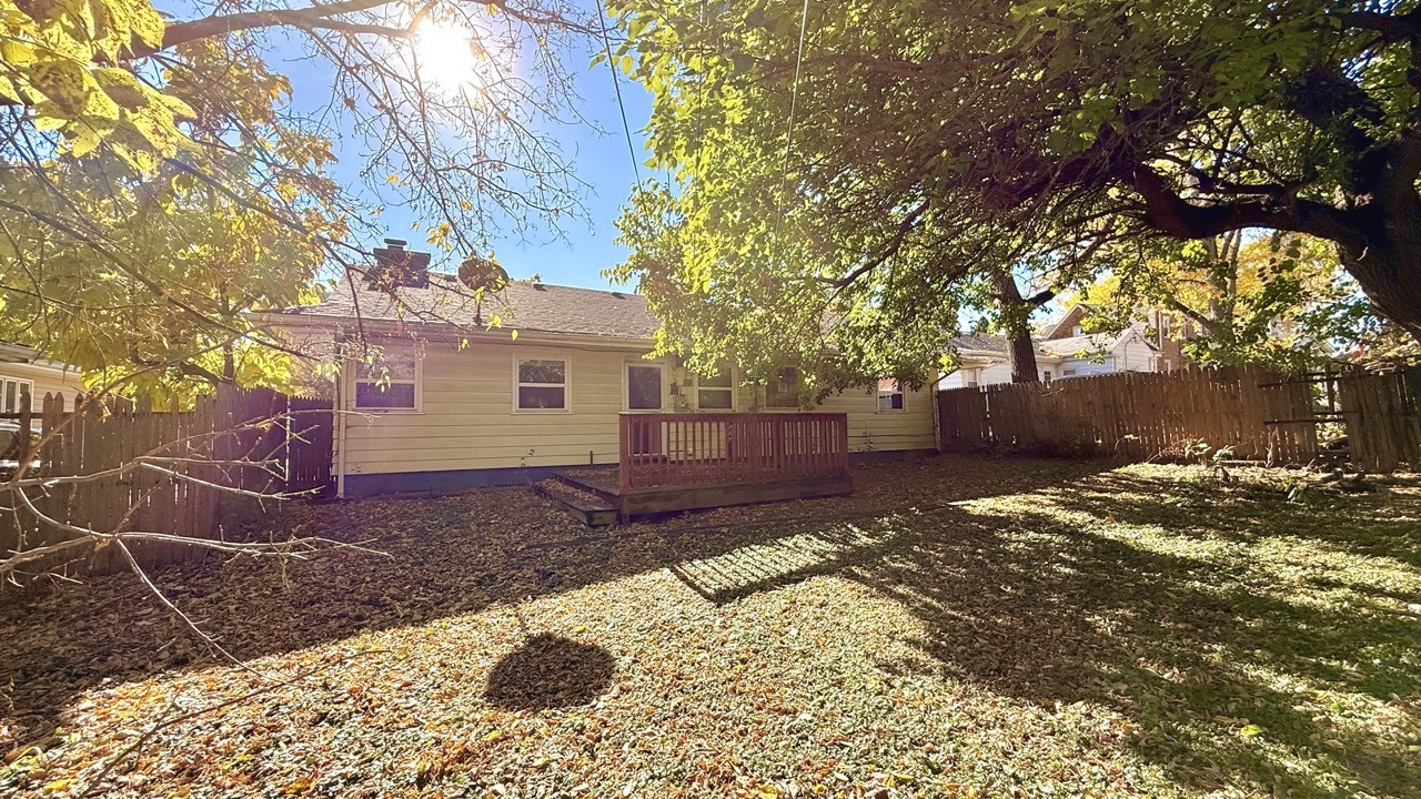 1828 183rd Street Homewood, IL 60430 - Photo 21 of 21 a view of a yard with plants and a large tree