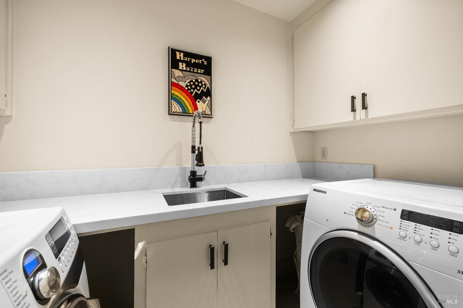 26 Mooring Road San Rafael, CA 94901 - Photo 52 of 60 A laundry room with laundry sink and cabinets is located on the bedroom level.