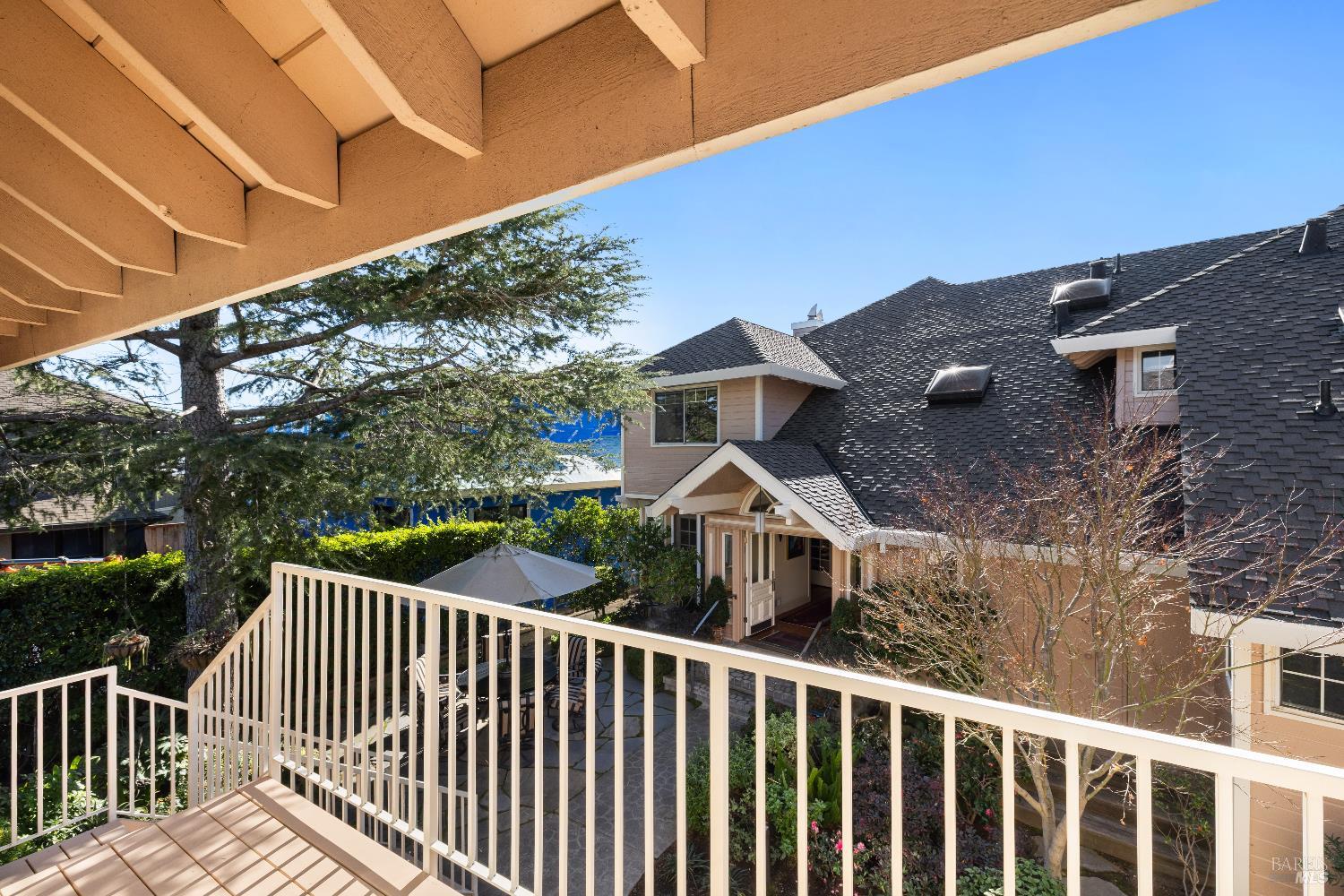 26 Mooring Road San Rafael, CA 94901 - Photo 54 of 60 The property includes a spacious detached guest house/ADU over the garaged that is shared between the two condos and used for guests. Includes a kitchenette and full bath.