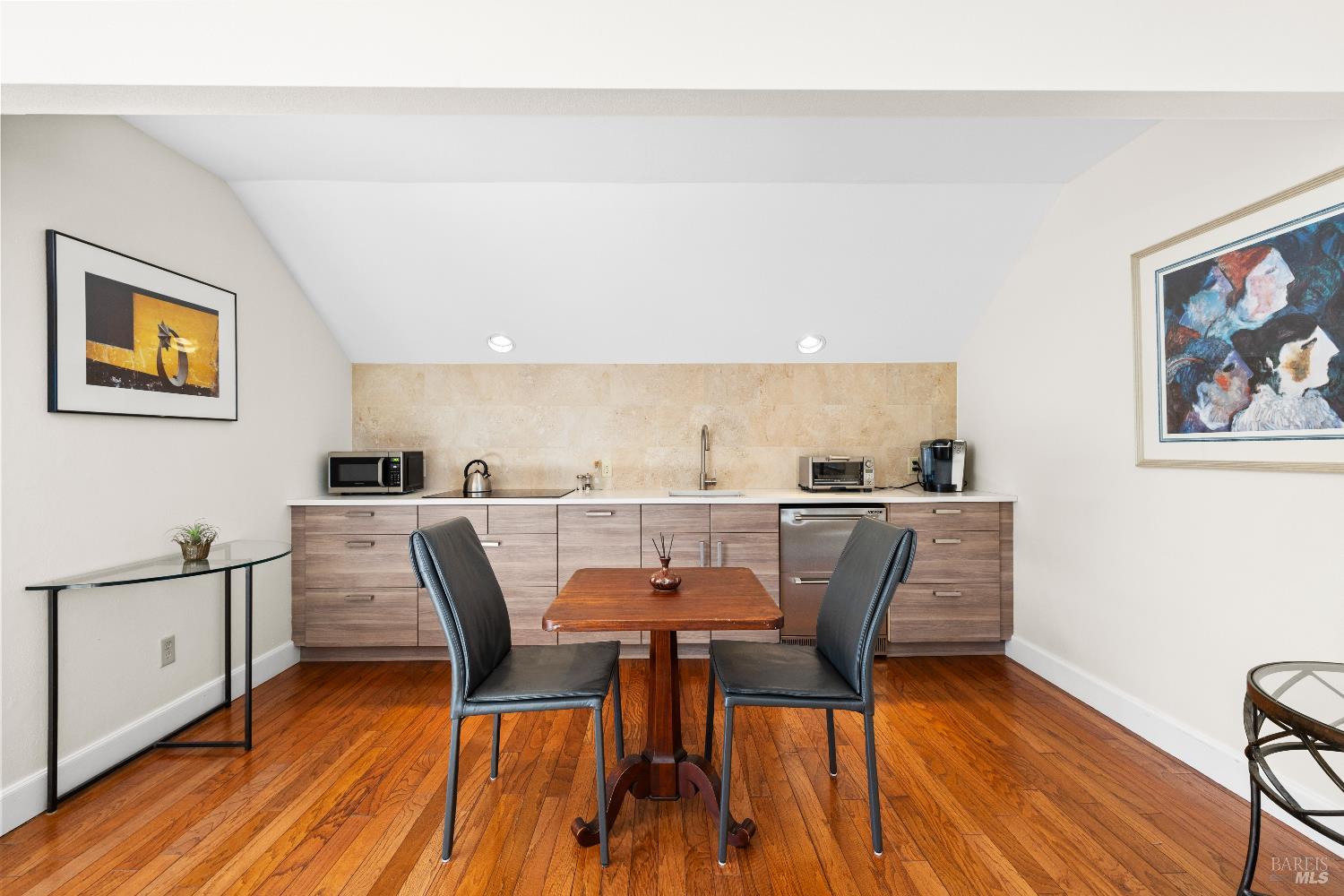 26 Mooring Road San Rafael, CA 94901 - Photo 57 of 60 The property includes a spacious detached guest house/ADU over the garaged that is shared between the two condos and used for guests. Includes a kitchenette and full bath.