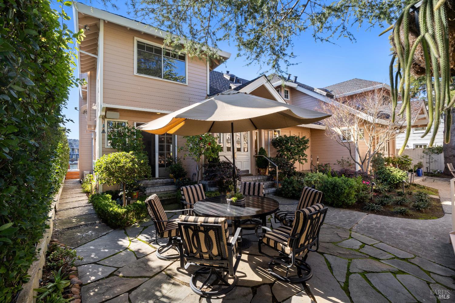 26 Mooring Road San Rafael, CA 94901 - Photo 8 of 60 A privacy gate located between the garages leads into a private garden courtyard.