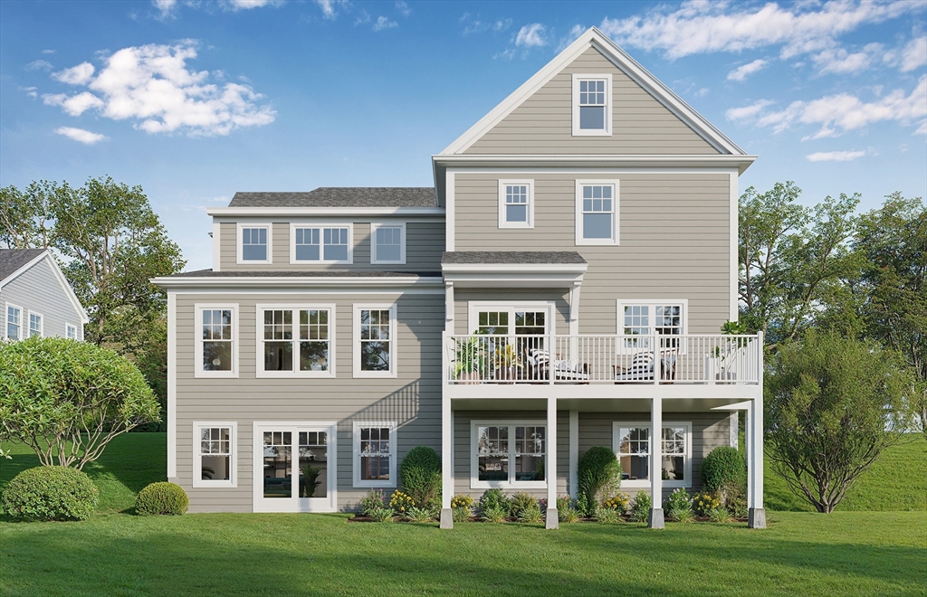 39 Town Way Winchester, MA 01890 - Photo 2 of 13 a front view of a house with a garden