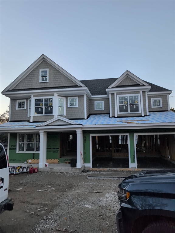 39 Town Way Winchester, MA 01890 - Photo 3 of 13 a front view of a house with garden