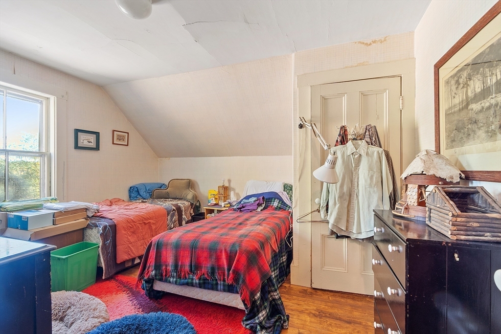 51 Farwell Road Tyngsborough, MA 01879 - Photo 17 of 33 a bedroom with two beds and a dresser