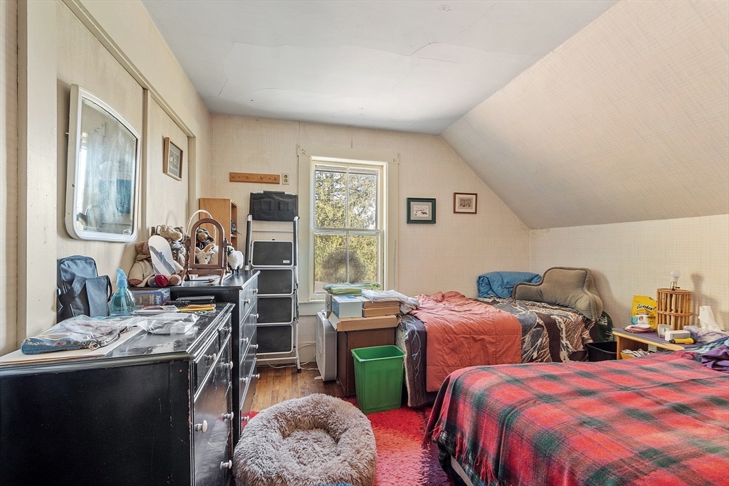 51 Farwell Road Tyngsborough, MA 01879 - Photo 18 of 33 a bedroom with two beds and a window