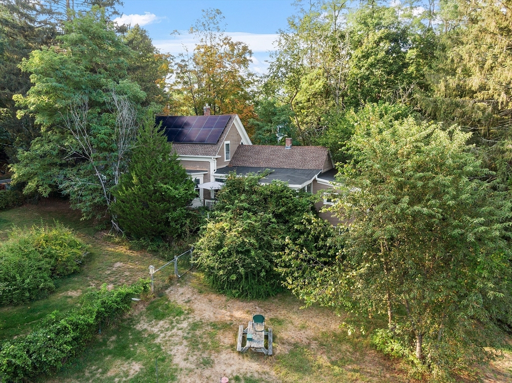 51 Farwell Road Tyngsborough, MA 01879 - Photo 23 of 33 a view of a house with a yard