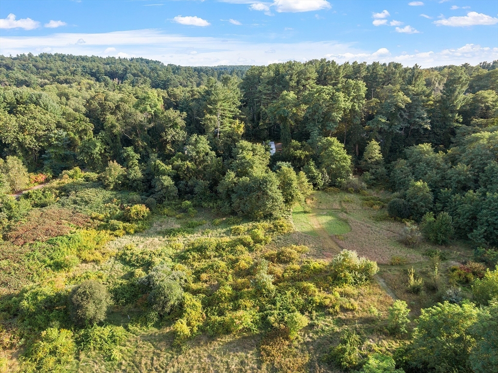 51 Farwell Road Tyngsborough, MA 01879 - Photo 24 of 33 an aerial view of residential houses with outdoor space and trees