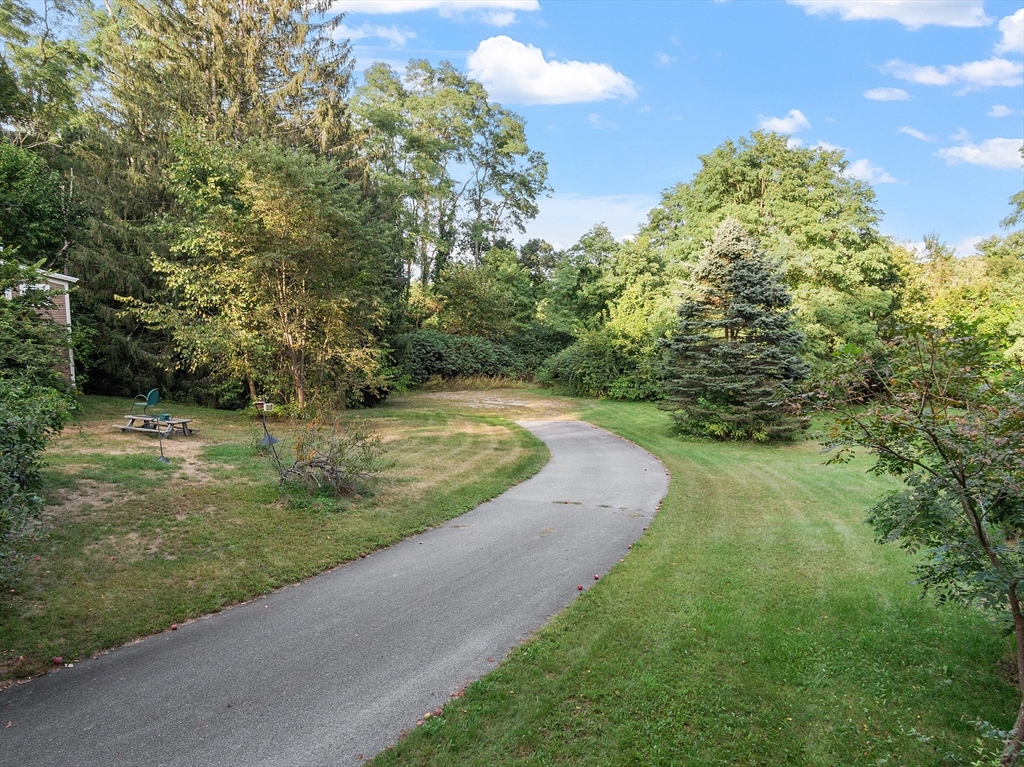 51 Farwell Road Tyngsborough, MA 01879 - Photo 29 of 33 a view of a park that has large trees