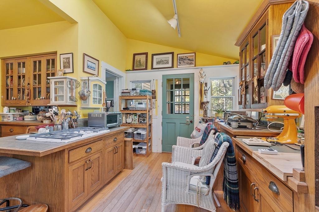 51 Farwell Road Tyngsborough, MA 01879 - Photo 5 of 33 a kitchen that has a lot of cabinets in it