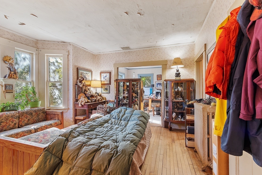 51 Farwell Road Tyngsborough, MA 01879 - Photo 10 of 33 a bed room with a bed and a couch