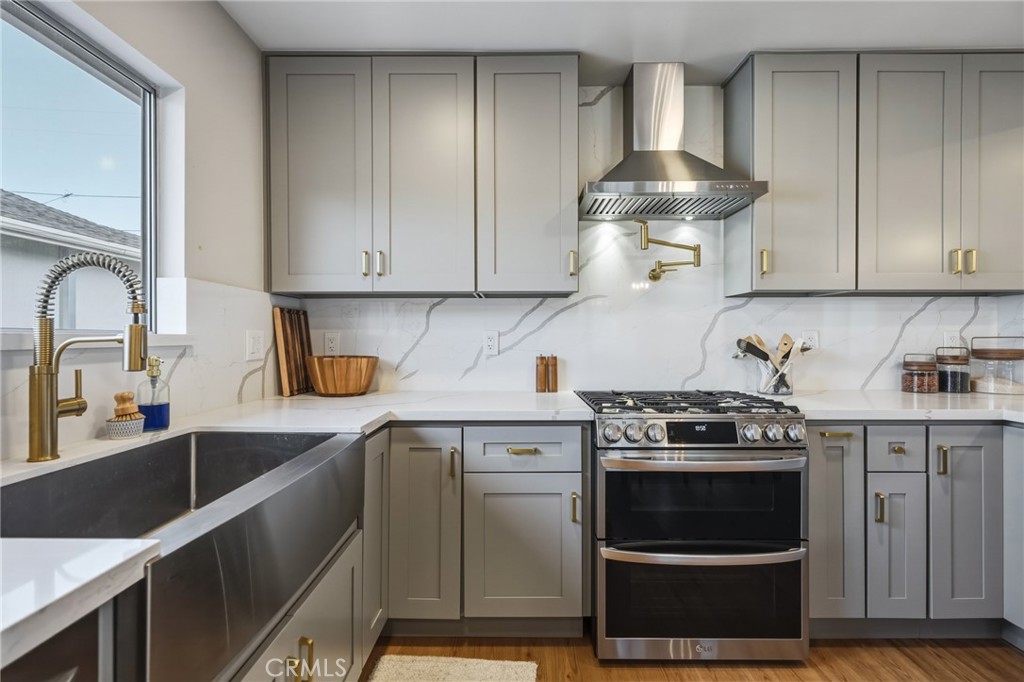2028 Chesson Street Duarte, CA 91010 - Photo 16 of 66 Chef's kitchen with quartz counters and backsplash, pot filler, double oven
