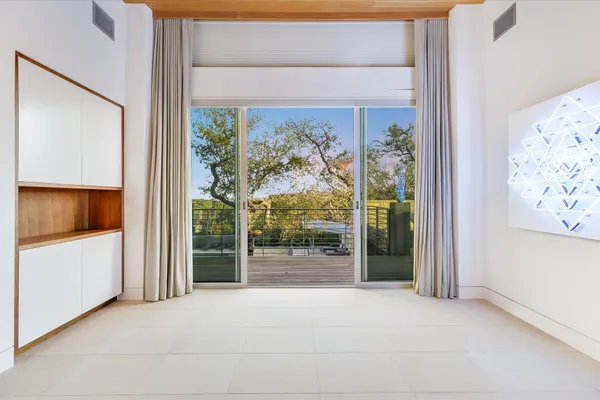 a bathroom with a tub a sink shower and mirror