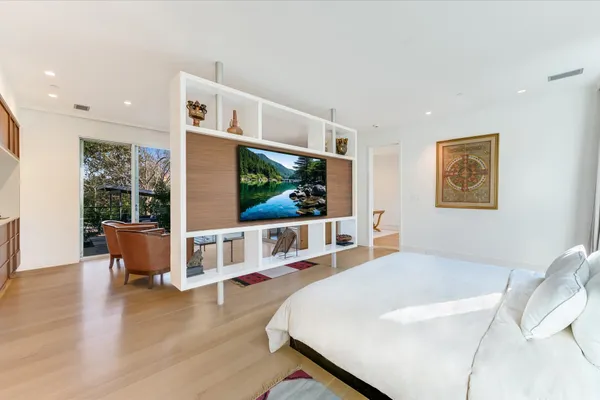 a view of a livingroom with furniture and a table