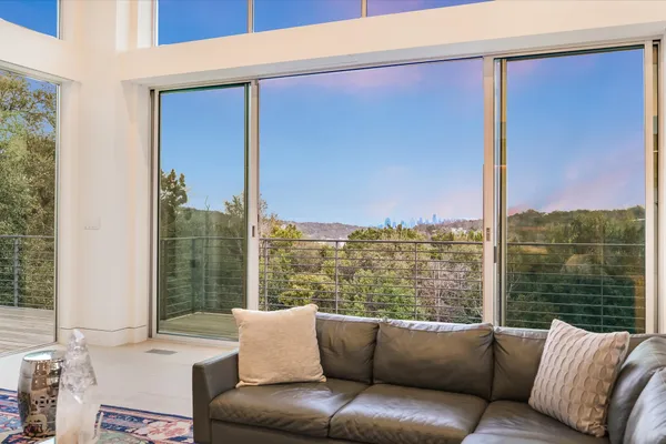 a view of a swimming pool with a yard