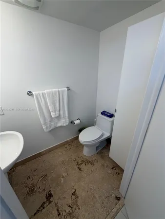 a bathroom with a sink and a toilet