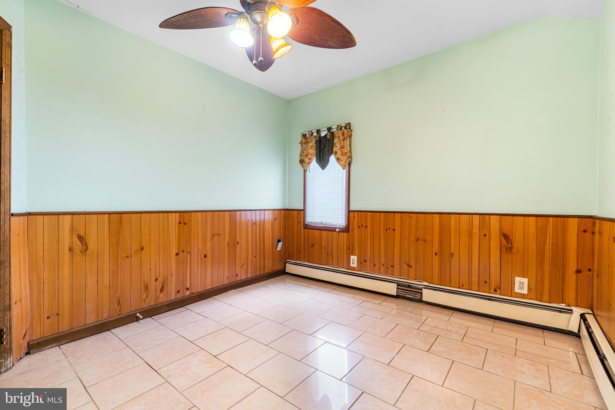 271 Old Croton Road Flemington, NJ 08822 - Photo 20 of 34 an empty room with a ceiling fan and window