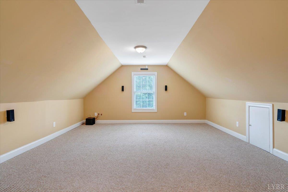 1250 Our Cove Road Huddleston, VA 24104 - Photo 38 of 70 a view of an empty room with a window