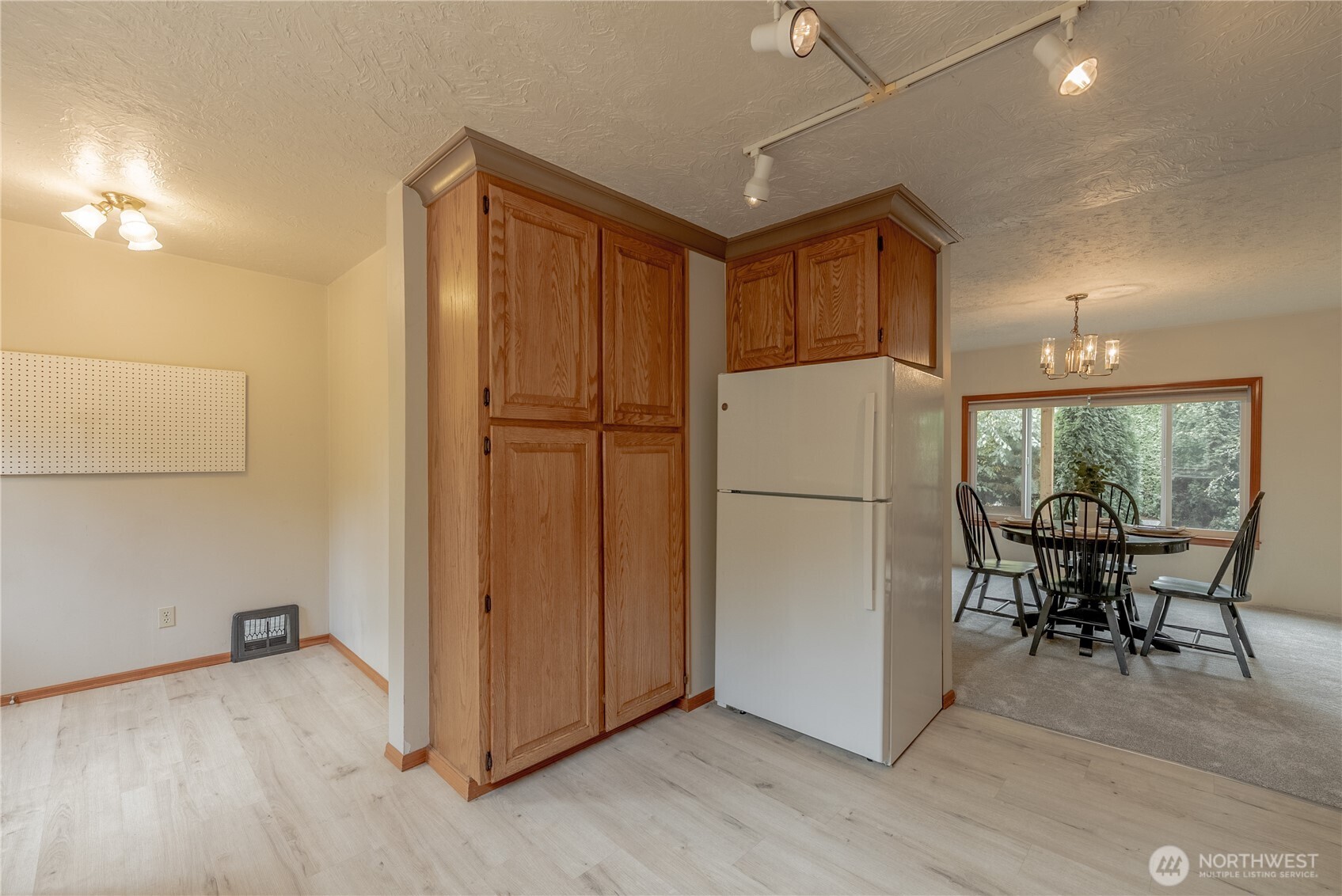 20006 68th Avenue Northeast Kenmore, WA 98028 - Photo 14 of 40 a view of kitchen with furniture and wooden floor