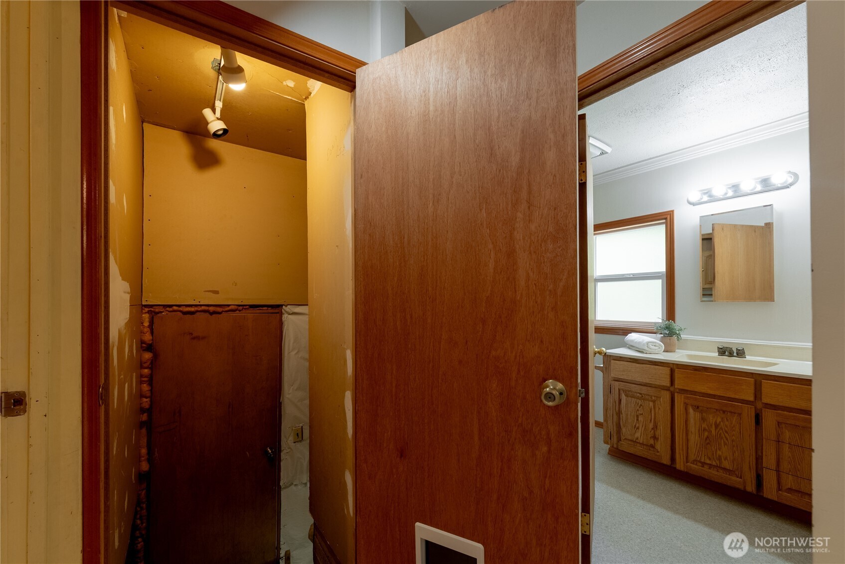 20006 68th Avenue Northeast Kenmore, WA 98028 - Photo 19 of 40 a bathroom with a granite countertop sink and a mirror