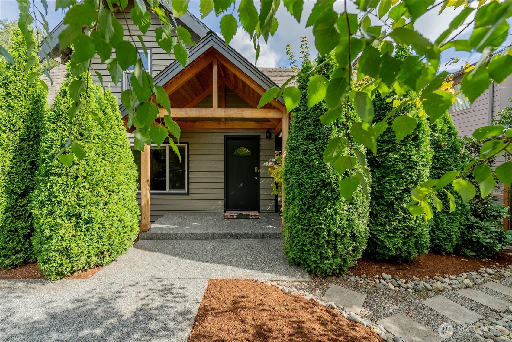 20006 68th Avenue Northeast Kenmore, WA 98028 - Photo 2 of 40 a front view of a house with a yard