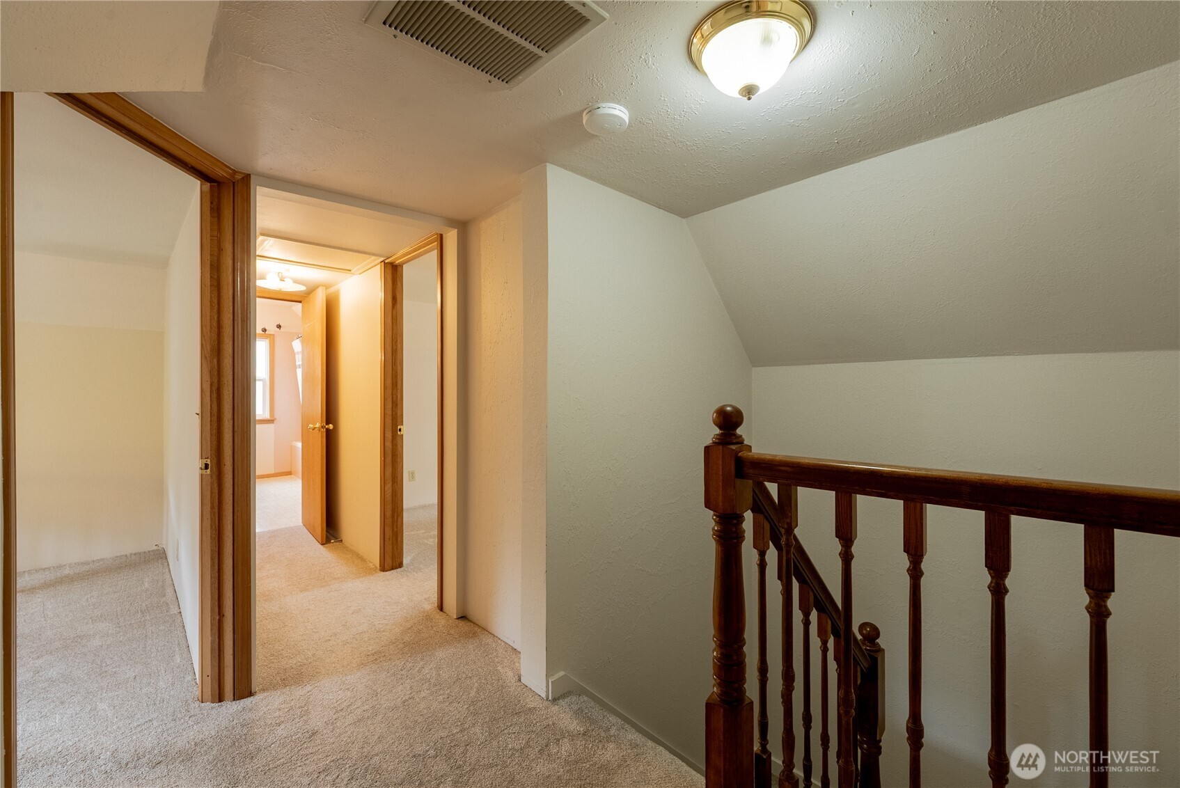 20006 68th Avenue Northeast Kenmore, WA 98028 - Photo 21 of 40 a view of a hallway with wooden floor and entryway