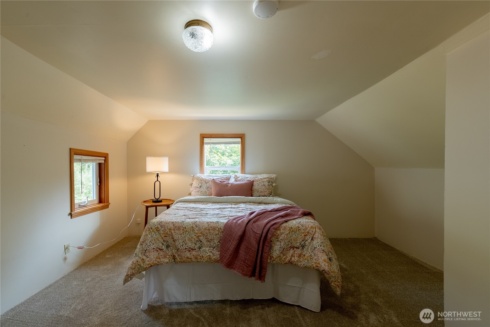 20006 68th Avenue Northeast Kenmore, WA 98028 - Photo 26 of 40 a bedroom with a bed and a window
