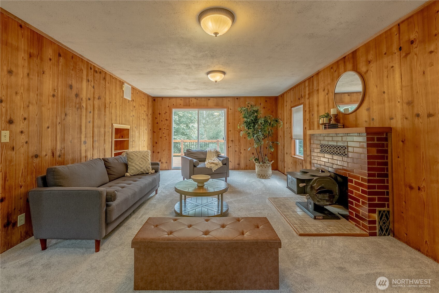 20006 68th Avenue Northeast Kenmore, WA 98028 - Photo 5 of 40 a living room with furniture and a fireplace