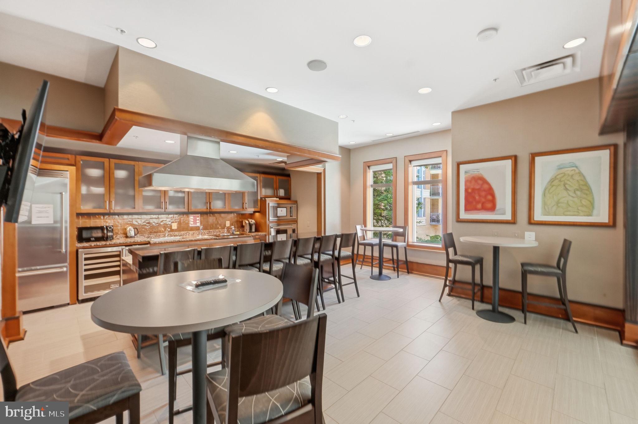 11990 Market Street, Unit 2103 Reston, VA 20190 - Photo 67 of 78 Modern kitchen with inviting ambiance.