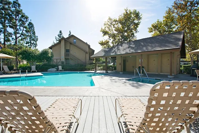 a view of a backyard with a garden and plants