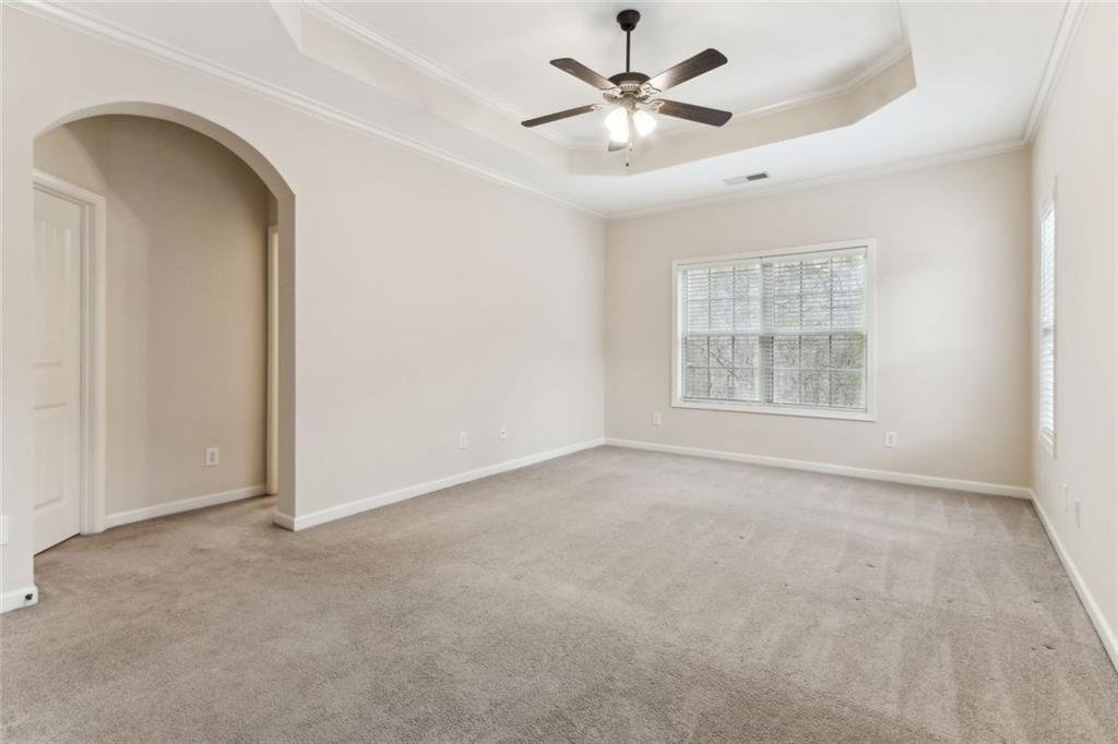 149 Trailside Circle Hiram, GA 30141 - Photo 17 of 35 an empty room with windows and fan