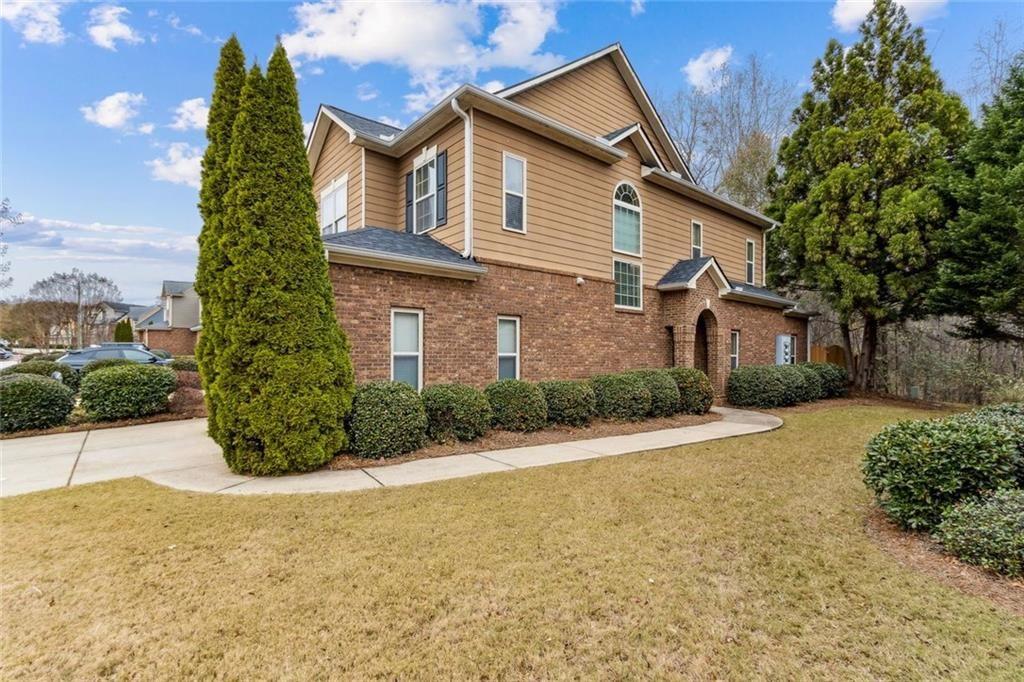 149 Trailside Circle Hiram, GA 30141 - Photo 2 of 35 a front view of a house with a yard