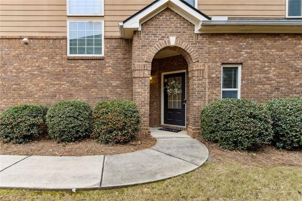 149 Trailside Circle Hiram, GA 30141 - Photo 3 of 35 a front view of a house with garden