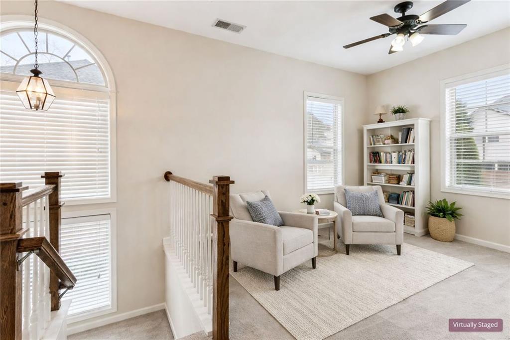 149 Trailside Circle Hiram, GA 30141 - Photo 6 of 35 a living room with furniture and a chandelier