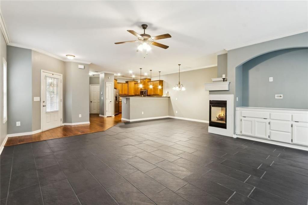 149 Trailside Circle Hiram, GA 30141 - Photo 10 of 35 a view of a kitchen with cabinet and a fireplace