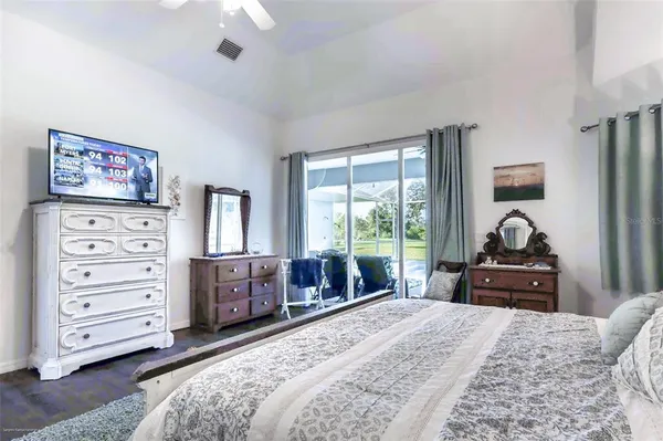 a view of bedroom with a bed and closet