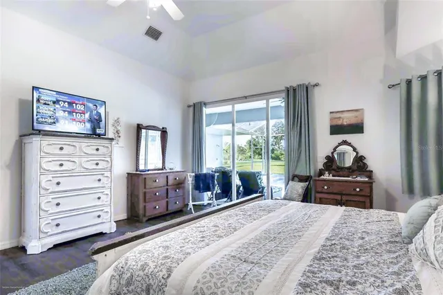 a view of bedroom with a bed and closet