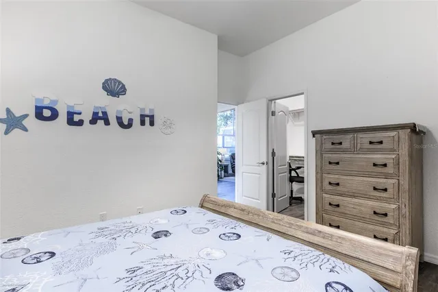 a room with furniture and large windows